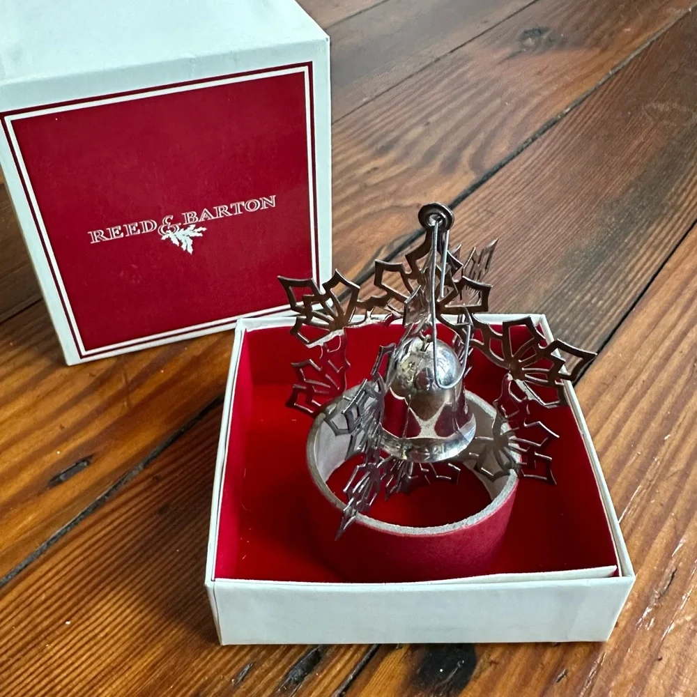 Vintage Reed & Barton silver spinning snowflake  & bell Christmas ornament